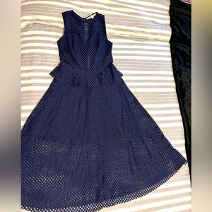 Beautiful net dress dark blue. See through around the waist and below knees